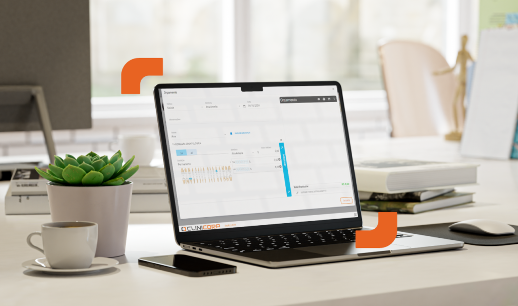 Imagem de um computador com o odontograma Clinicorp na tela.